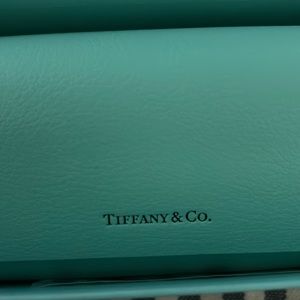 Brand new, never worn, Tiffany and Co Sunglasses made by Luxottica.